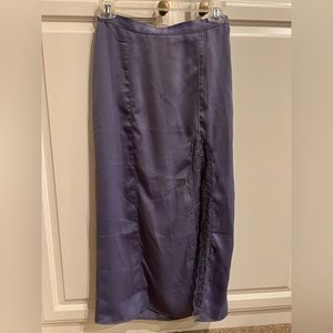 Urban Outfitters lavender slip skirt. Pretty lace detail on slit.
